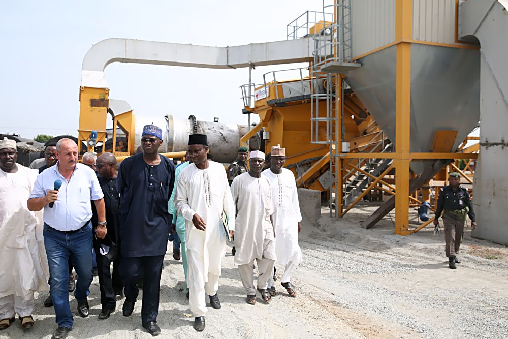 Hon. Minister of Power, Works & Housing, Mr Babatunde Fashola, SAN(middle)  being briefed by the  Manager Director, Messrs. Triacta Nigeria Limited, Mr Elie Farhat,(left)  with them is the Federal Controller of Works Sokoto State, Engr. Felix Bamisaye (right) and others during the Ministerâ€™s inspection tour of the Rehabilitation of Sokoto -Tambuwal  road in Sokoto State on Sunday 9th October 2016