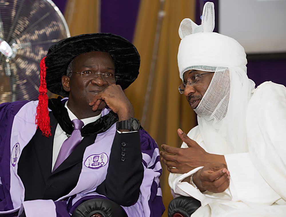 Hon. Minister of Power, Works & Housing , Mr Babatunde Fashola, SAN(left) and Chancellor University of Benin and Sarkin Kano, Muhammad Sanusi II(right) during the University of Benin 42nd Convocation Lecture with the theme, Freedom from Fear, Choices before the New Generation,"at the Akin Deko Auditorium, Ugbowo Campus in Benin City, Edo State on Friday 25th November ,2016