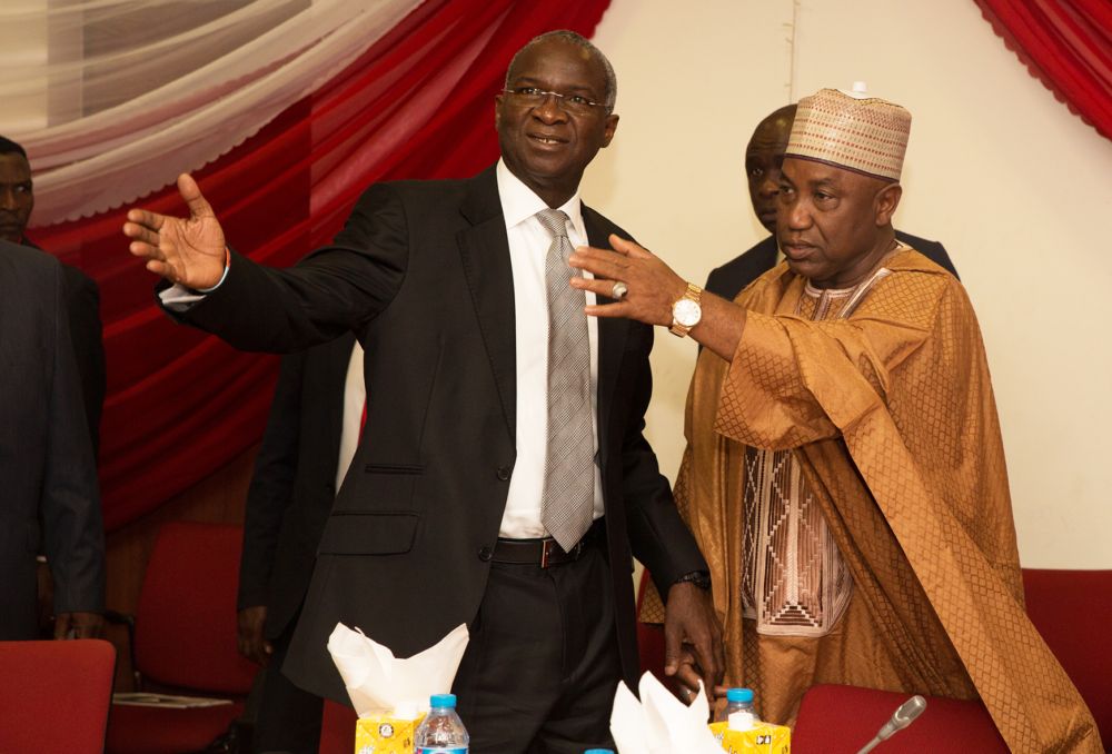 Minister of Power, Works & Housing, Mr Babatunde Fashola, SAN (left) and Chairman Senate Committee on Works, Senator Kabiru Ibrahim Gaya(right) at the Senate Committee on Works' Public Hearing on, "A Bill for an Act to Repeal the Federal Roads Maintenance Act 2007 and to Re-Enact the Federal Roads Authority Bill 2016" , "A Bill for an Act to Establish the Infrastructure Development Commission" and "The Need for the Establishment of Tollgates on our Federal Highways"  at the Senate Committee Room 301, New Senate Building , National Assembly Complex, Abuja on Monday 5th, December  2016. 