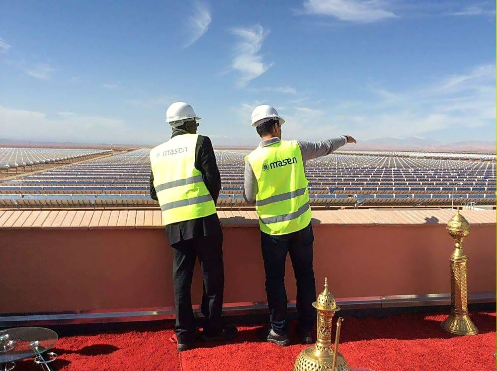 Hon. Minister of Power, Works & Housing , Mr Babatunde Fashola, SAN(right)  being briefed by an official during an inspection tour of the Noor Solar Power Plant while attending  the United Nations Climate Change Conference in Morocco.