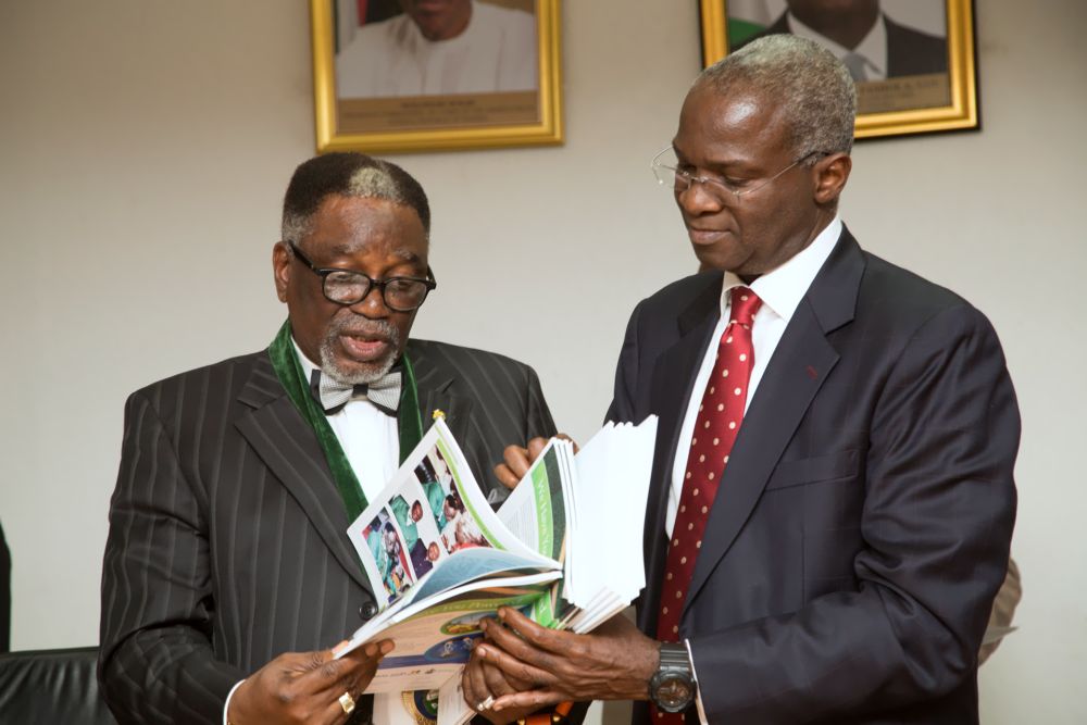 Hon. Minister of Power, Works & Housing , Mr Babatunde Fashola, SAN(right) and President, Nigerian Society of Engineers, Engr. Otis Anyaeji during a courtesy visit to the Minister to discuss issues relating to infrastructure development and the role of Nigerian Engineers at the Ministry of Power, Works & HousingÂ  headquarters, Mabushi, Abuja on Tuesday 1st, November 2016.